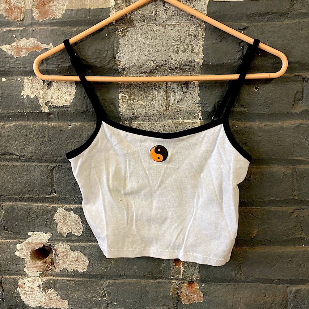 BDG -Urban Outfitters crop tank with neon Ying-Yang symbol.